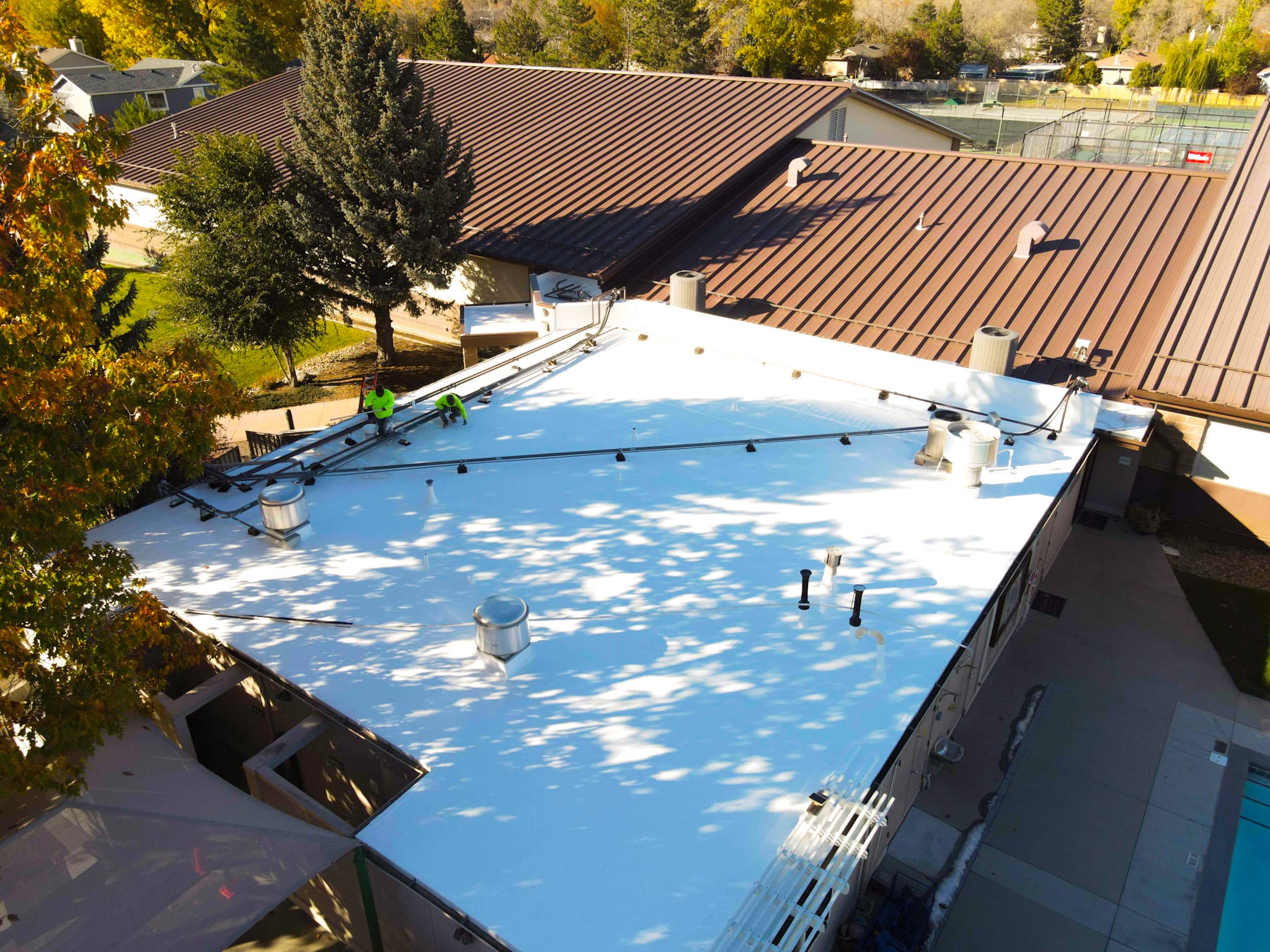 A commercial roof with a fresh coating
